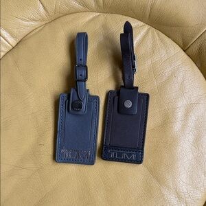 TUMI Black and Navy Leather Bag Tags set of 2